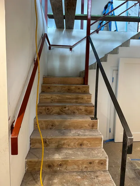Handrails on indoor stairs during work