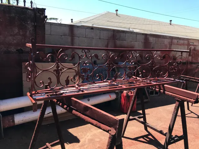 Ornamental metalwork on workshop supports