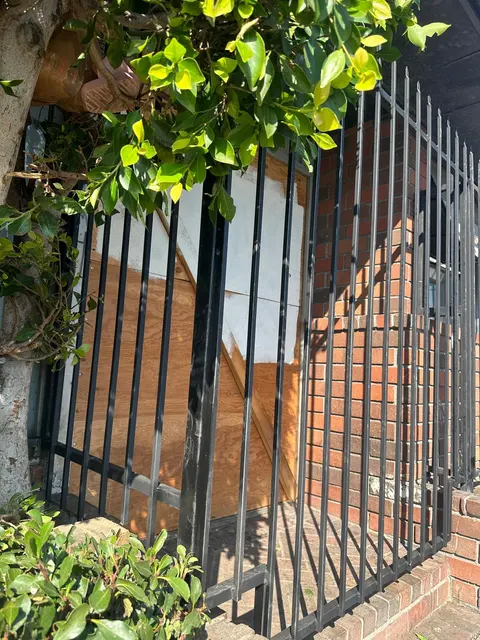 Metal fence and entrance detail